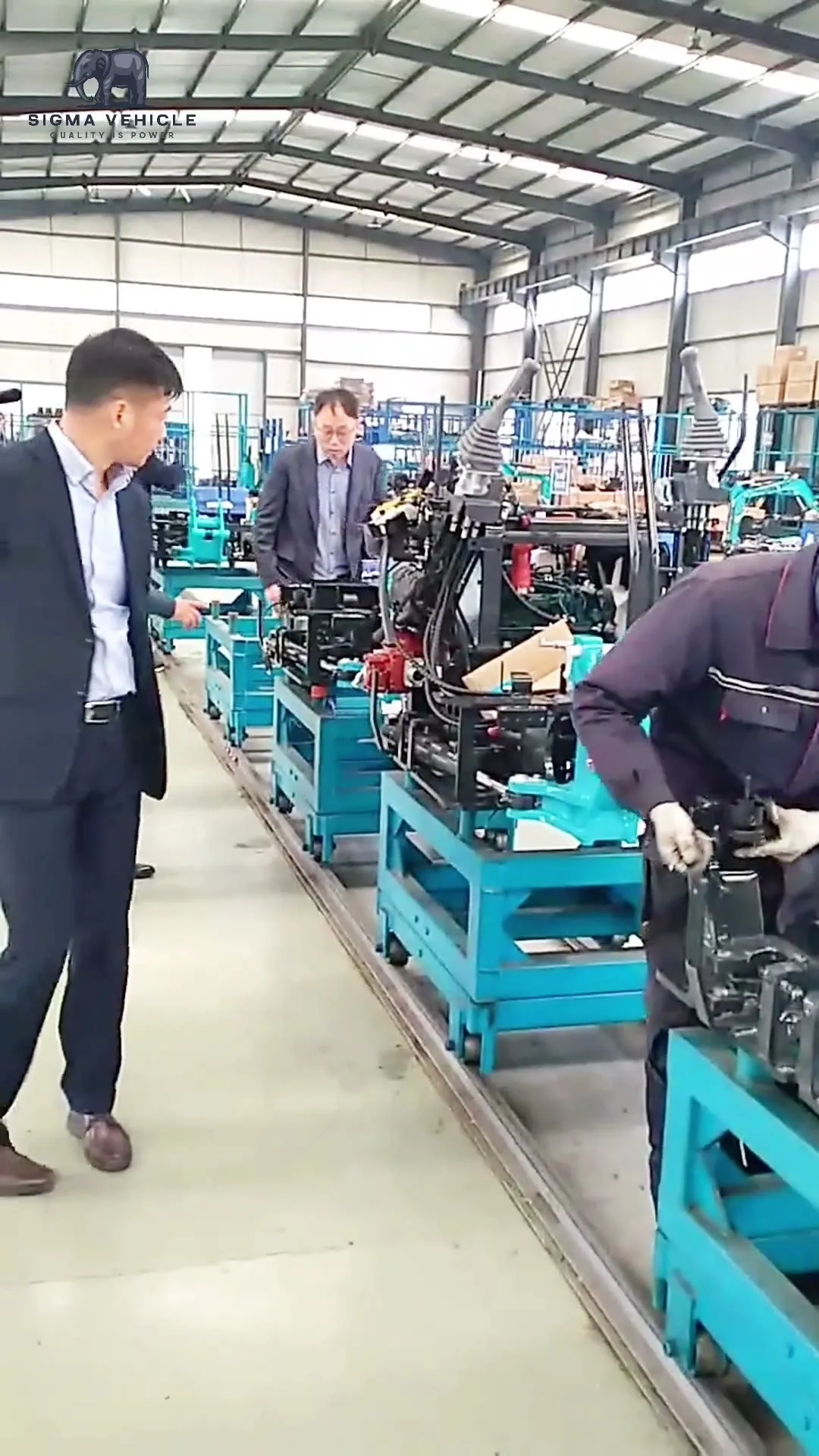 Assembly line inside the production workshop with components on work stands